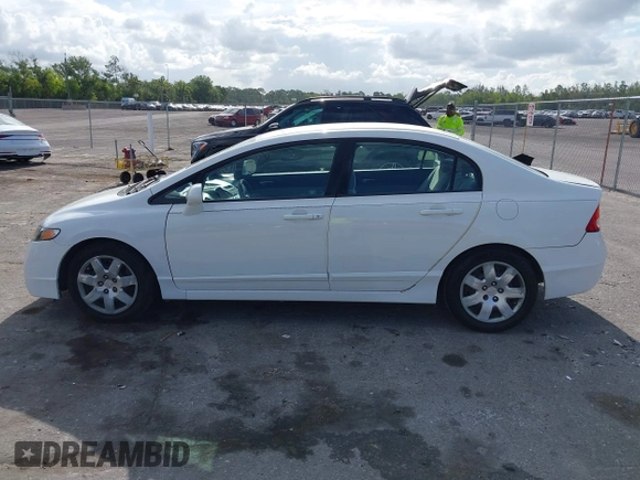 2010 Honda Civic LX with VIN 2HGFA1F54AH533810, listed as a IAAI auction lot 42171253 with 211,551 mi miles and . Bid and sale history available at DreamBid. Image 14.