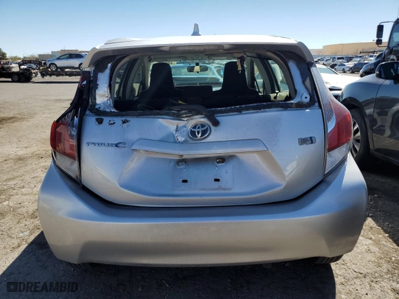 2015 Toyota Prius c One with VIN JTDKDTB30F1099699, listed as a Copart auction lot 49233655 with 106,041 mi miles and Salvage Title. Bid and sale history available at carsss.com. Image 6.