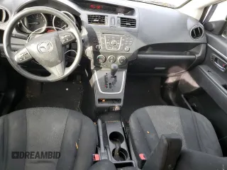 2012 Mazda 5 Sport с VIN JM1CW2BL2C0118957, выставлен на аукционе Copart как лот 82622764 с пробегом 107 691 миль миль и Списание • Salvage title. История ставок и продаж доступна на DreamBid. Изображение 8.