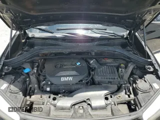 2016 BMW X1 xDrive28i z VIN WBXHT3C34G5E54952, wystawiony jako Copart lot #60713485 z przebiegiem 69 395 mil mil oraz Szkoda całkowita • Salvage title. Historia ofert i sprzedaży dostępna na DreamBid. Obrazek 12.