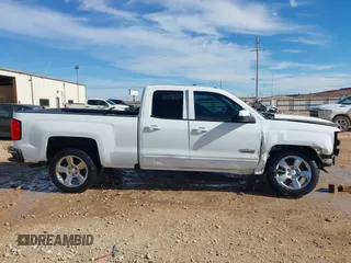 2018 Chevrolet Silverado 1500 LT with VIN 1GCRCREC4JZ368426, listed as a IAAI auction lot 41343347 with 114,821 mi miles and . Bid and sale history available at DreamBid. Image 14.