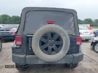 2014 Jeep Wrangler Unlimited Sport with VIN 1C4BJWDG0EL290441, listed as a IAAI auction lot 42204434 with 138,367 mi miles and . Bid and sale history available at DreamBid. Image 16.