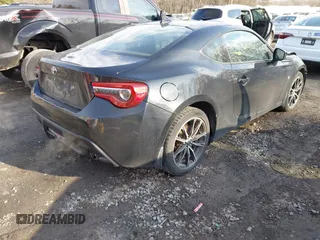 2017 Toyota 86 with VIN JF1ZNAA12H8703138, listed as a IAAI auction lot 41750709 with 126,254 mi miles. Bid and sale history available at carsss.com. Image 4.