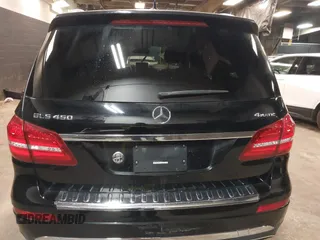 2017 Mercedes-Benz GLS 450 z VIN 4JGDF6EE1HA846825, wystawiony jako IAAI lot #41482461 z przebiegiem 64 135 mil mil oraz . Historia ofert i sprzedaży dostępna na DreamBid. Obrazek 17.