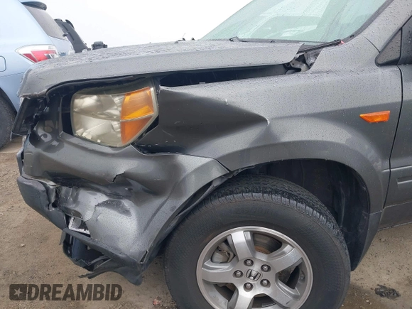 2007 Honda Pilot EX with VIN 2HKYF18497H500458, listed as a IAAI auction lot 41784273 with 114,454 mi miles. Bid and sale history available at carsss.com. Image 6.