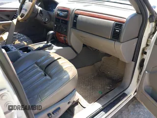 1999 Jeep Grand Cherokee Limited with VIN 1J4G268S1XC700940, listed as a IAAI auction lot 42328781 with 315,142 mi miles and . Bid and sale history available at DreamBid. Image 5.