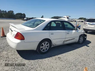 2002 Toyota Avalon XL z VIN 4T1BF28BX2U250961, wystawiony jako Copart lot #50400245 z przebiegiem 351 091 mil mil oraz Szkoda całkowita • Salvage title. Historia ofert i sprzedaży dostępna na DreamBid. Obrazek 3.