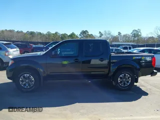 2019 Nissan Frontier SV with VIN 1N6DD0ER1KN700433, listed as a IAAI auction lot 41731808 with 81,477 mi miles and . Bid and sale history available at DreamBid. Image 14.