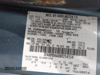 2011 Ford Fusion SE with VIN 3FAHP0HA0BR254554, listed as a IAAI auction lot 42067438 with 104,691 mi miles. Bid and sale history available at carsss.com. Image 9.