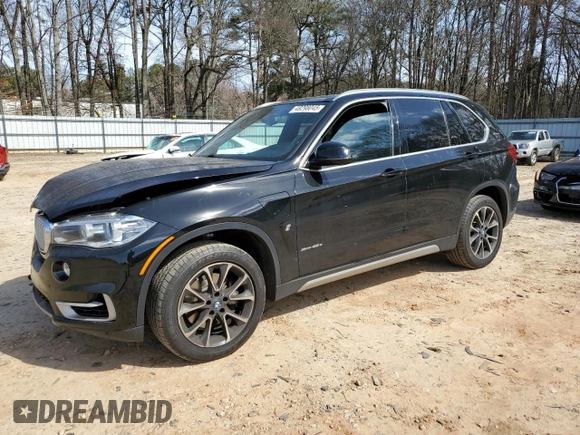 2018 BMW X5 xDrive40e iPerformance with VIN 5UXKT0C52J0V99605, listed as a Copart auction lot 48298045 with 97,339 mi miles and Salvage Title. Bid and sale history available at carsss.com. Image 1.