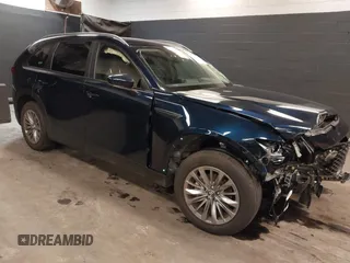2024 Mazda CX-90 Select z VIN JM3KKAHD4R1182557, wystawiony jako IAAI lot #40770956 z przebiegiem 4 111 mil mil oraz . Historia ofert i sprzedaży dostępna na DreamBid. Obrazek 1.