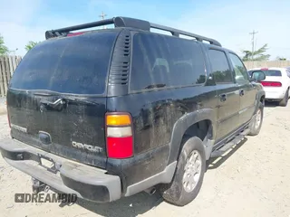 2005 Chevrolet Suburban Z71 with VIN 3GNFK16Z65G214436, listed as a IAAI auction lot 42104821 with 230,386 mi miles. Bid and sale history available at carsss.com. Image 4.
