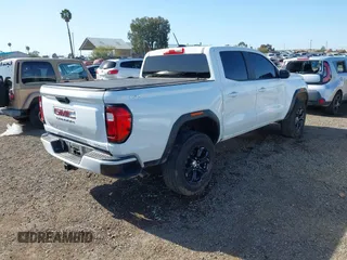 2024 GMC Canyon 4WD Elevation with VIN 1GTP6BEK9R1130353, listed as a IAAI auction lot 41967300 with 10,966 mi miles and . Bid and sale history available at carsss.com. Image 4.