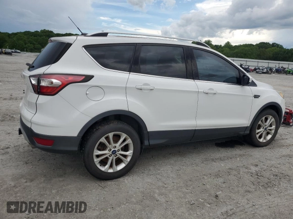 2017 Ford Escape SE z VIN 1FMCU0G99HUA75866, wystawiony jako Copart lot #57274785 z przebiegiem 132 874 mil mil oraz Czysty tytuł • Clean title. Historia ofert i sprzedaży dostępna na DreamBid. Obrazek 3.