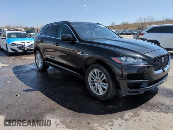 2019 Jaguar F-Pace 25t Prestige z VIN SADCK2FX8KA397627, wystawiony jako Copart lot #52366445 z przebiegiem 101 727 mil mil oraz Szkoda całkowita • Salvage title. Historia ofert i sprzedaży dostępna na DreamBid. Obrazek 14.
