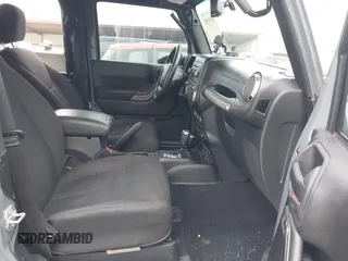 2015 Jeep Wrangler Sport with VIN 1C4GJWAG7FL585631, listed as a IAAI auction lot 41943582 with 88,649 mi miles and . Bid and sale history available at DreamBid. Image 5.