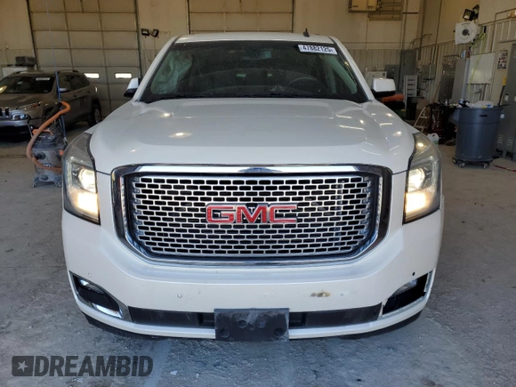 2015 GMC Yukon Denali with VIN 1GKS2CKJ7FR266750, listed as a Copart auction lot 47882125 with 121,705 mi miles and Salvage Title. Bid and sale history available at carsss.com. Image 5.