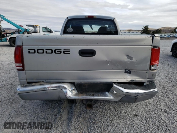 1999 Dodge Dakota SLT with VIN 1B7GG22Y2XS165166, listed as a Copart auction lot 47440435 with 167,345 mi miles and Salvage Title. Bid and sale history available at DreamBid. Image 6.
