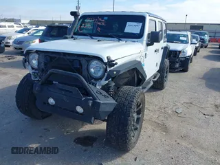 2018 Jeep Wrangler Unlimited Sport S с VIN 1C4HJXDG0JW205803, выставлен на аукционе IAAI как лот 41615097 с пробегом Не указан миль и . История ставок и продаж доступна на DreamBid. Изображение 17.