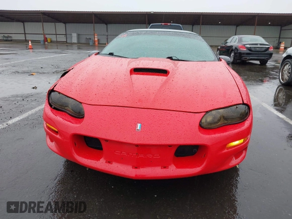 1999 Chevrolet Camaro Z28 z VIN 2G1FP22G2X2112215, wystawiony jako IAAI lot #41459474 z przebiegiem 106 832 mil mil oraz . Historia ofert i sprzedaży dostępna na DreamBid. Obrazek 12.