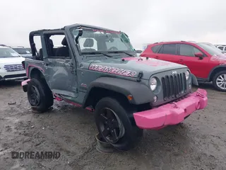 2015 Jeep Wrangler Sport with VIN 1C4AJWAG3FL589214, listed as a IAAI auction lot 41056259 with 101,758 mi miles and . Bid and sale history available at DreamBid. Image 1.
