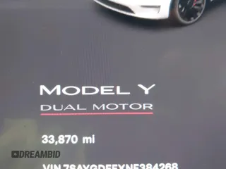 2022 Tesla Model Y Performance with VIN 7SAYGDEFXNF384268, listed as a IAAI auction lot 41558359 with 33,870 mi miles and . Bid and sale history available at DreamBid. Image 14.