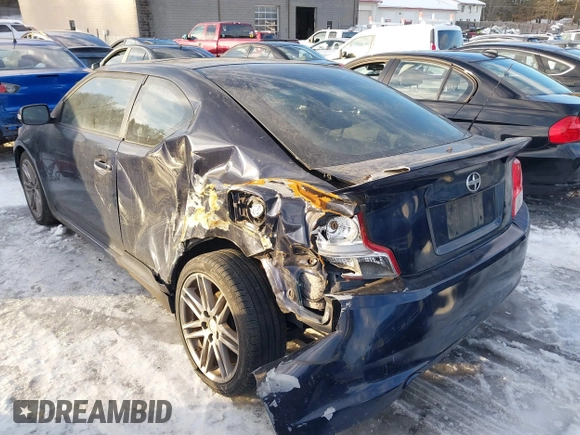 2011 Scion tC z VIN JTKJF5C78B3018653, wystawiony jako IAAI lot #41588371 z przebiegiem 143 038 mil mil oraz . Historia ofert i sprzedaży dostępna na DreamBid. Obrazek 3.