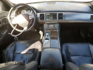 2010 Jaguar XF with VIN SAJWA0JC3AMR49540, listed as a Copart auction lot 87475704 with 137,274 mi miles and Salvage Title. Bid and sale history available at DreamBid. Image 8.