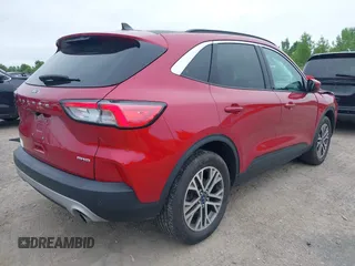 2021 Ford Escape SEL z VIN 1FMCU9H61MUA64735, wystawiony jako IAAI lot #42511030 z przebiegiem 85 707 mil mil oraz . Historia ofert i sprzedaży dostępna na DreamBid. Obrazek 4.