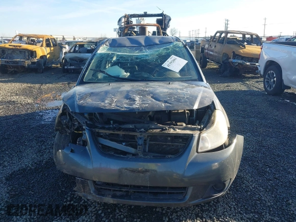 2010 Suzuki SX4 with VIN JS2YC5A40A6300053, listed as a IAAI auction lot 41392061 with 114,863 mi miles and . Bid and sale history available at DreamBid. Image 12.