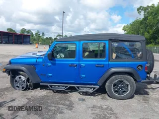 2022 Jeep Wrangler Unlimited Sport with VIN 1C4HJXDG3NW117155, listed as a IAAI auction lot 40240879 with 36,323 mi miles and . Bid and sale history available at DreamBid. Image 14.
