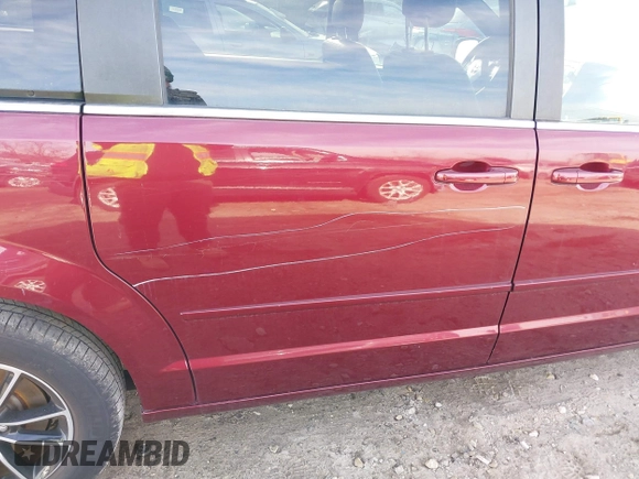 2017 Dodge Grand Caravan SXT with VIN 2C4RDGCGXHR624452, listed as a IAAI auction lot 41624033 with 98,912 mi miles and . Bid and sale history available at DreamBid. Image 6.