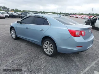 2013 Chevrolet Malibu LTZ with VIN 1G11H5SA2DU114542, listed as a IAAI auction lot 41441051 with 170,995 mi miles. Bid and sale history available at carsss.com. Image 3.
