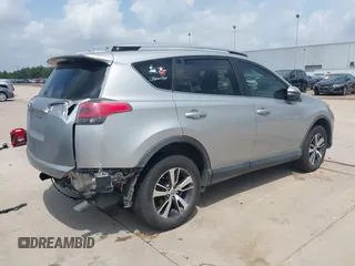 2018 Toyota RAV4 XLE z VIN JTMWFREV5JJ202927, wystawiony jako IAAI lot #42111306 z przebiegiem 118 385 mil mil oraz . Historia ofert i sprzedaży dostępna na DreamBid. Obrazek 4.