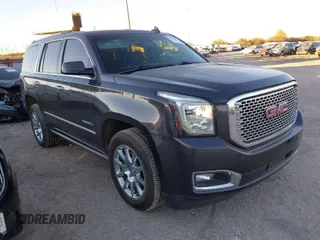2015 GMC Yukon Denali with VIN 1GKS2CKJ6FR614179, listed as a IAAI auction lot 40936491 with 169,201 mi miles. Bid and sale history available at carsss.com. Image 1.