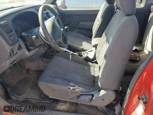 1999 Nissan Frontier XE with VIN 1N6ED26Y1XC302907, listed as a Copart auction lot 51323035 with 218,325 mi miles and Clean title. Bid and sale history available at DreamBid. Image 7.