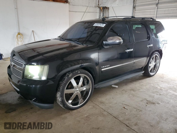 2010 Chevrolet Tahoe LTZ with VIN 1GNUKCE05AR236038, listed as a Copart auction lot 63033425 with 132,236 mi miles and Salvage title. Bid and sale history available at DreamBid. Image 1.