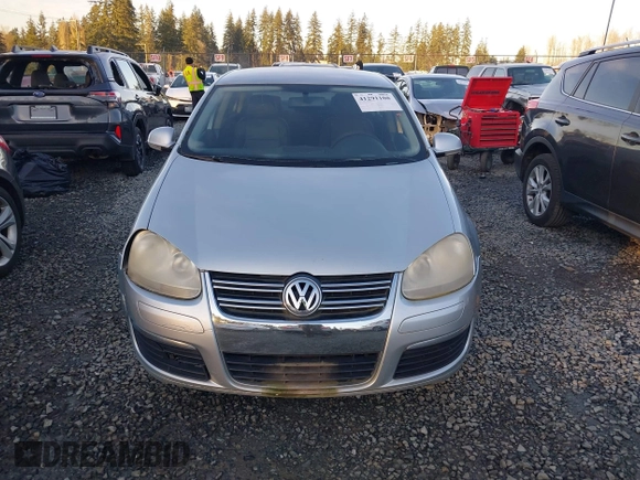 2007 Volkswagen Jetta 2.5 z VIN 3VWRG71K37M029136, wystawiony jako IAAI lot #41291108 z przebiegiem 219 980 mil mil oraz . Historia ofert i sprzedaży dostępna na DreamBid. Obrazek 12.