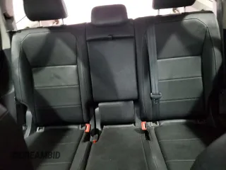 2018 Volkswagen Tiguan SEL z VIN 3VV2B7AX7JM002724, wystawiony jako Copart lot #57390965 z przebiegiem 103 661 mil mil oraz Szkoda całkowita • Salvage title. Historia ofert i sprzedaży dostępna na DreamBid. Obrazek 10.