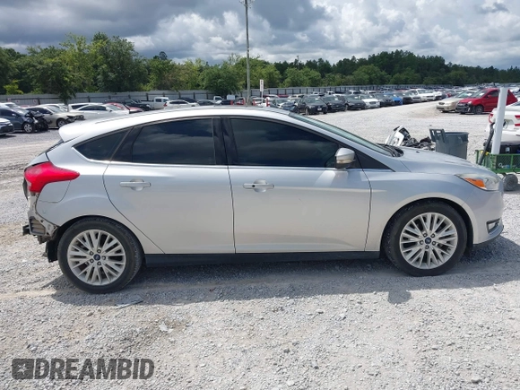 2018 Ford Focus Titanium with VIN 1FADP3N29JL232336, listed as a IAAI auction lot 42485243 with 82,113 mi miles and . Bid and sale history available at DreamBid. Image 13.