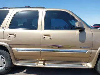 2001 GMC Yukon SLT with VIN 1GKEC13T71J113257, listed as a IAAI auction lot 41975910 with 195,509 mi miles. Bid and sale history available at carsss.com. Image 13.