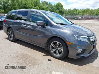 2020 Honda Odyssey Touring z VIN 5FNRL6H88LB006307, wystawiony jako IAAI lot #42332172 z przebiegiem 44 659 mil mil oraz . Historia ofert i sprzedaży dostępna na DreamBid. Obrazek 1.