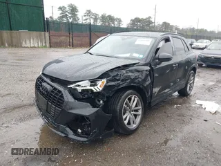 2024 Audi Q3 S line Premium Plus z VIN WA1EECF32R1043458, wystawiony jako IAAI lot #41965598 z przebiegiem 21 524 mil mil oraz . Historia ofert i sprzedaży dostępna na DreamBid. Obrazek 20.