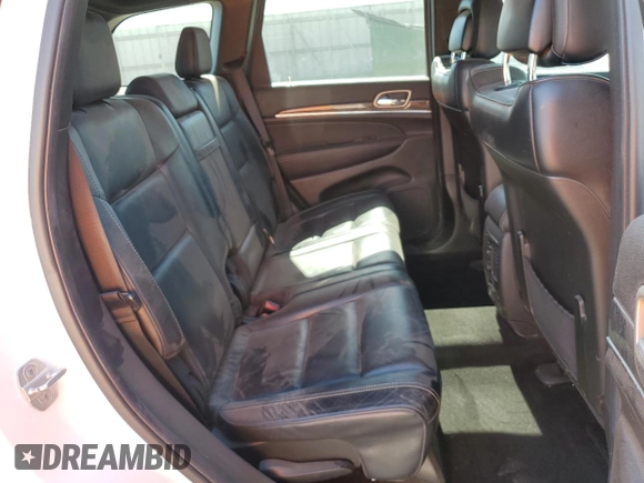 2014 Jeep Grand Cherokee Overland with VIN 1C4RJFCT7EC105296, listed as a Copart auction lot 50822775 with 180,067 mi miles and Salvage Title. Bid and sale history available at DreamBid. Image 11.