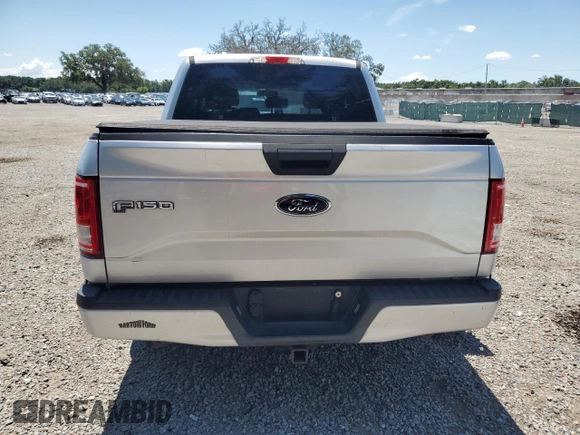 2016 Ford F-150 XL with VIN 1FTEW1CP0GKF41082, listed as a Copart auction lot 62001965 with 205,027 mi miles and Salvage title. Bid and sale history available at DreamBid. Image 6.