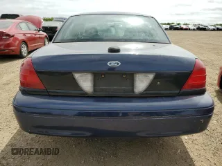 2007 Ford Police Interceptor с VIN 2FAFP71WX7X126448, выставлен на аукционе Copart как лот 57468085 с пробегом 127 368 миль миль и Списание • Salvage title. История ставок и продаж доступна на DreamBid. Изображение 6.