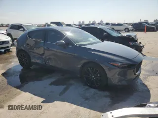 2021 Mazda 3 Premium with VIN JM1BPAML4M1401436, listed as a Copart auction lot 52317505 with 72,680 mi miles and Salvage Title. Bid and sale history available at DreamBid. Image 4.