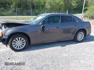 2014 Chrysler 300 z VIN 2C3CCAAG1EH212760, wystawiony jako IAAI lot #42139245 z przebiegiem 129 868 mil mil oraz . Historia ofert i sprzedaży dostępna na DreamBid. Obrazek 14.