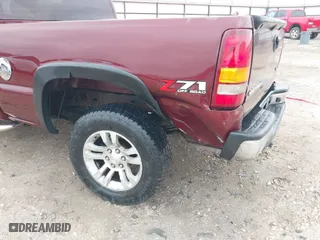 2003 Chevrolet Silverado 1500 LS with VIN 2GCEK19T031209878, listed as a IAAI auction lot 41498378 with 248,154 mi miles. Bid and sale history available at carsss.com. Image 6.