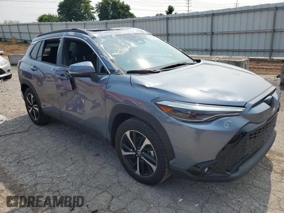 2023 Toyota Corolla Cross Hybrid S with VIN 7MUFBABG6PV014406, listed as a Copart auction lot 59944835 with 8,252 mi miles and Salvage title. Bid and sale history available at DreamBid. Image 4.